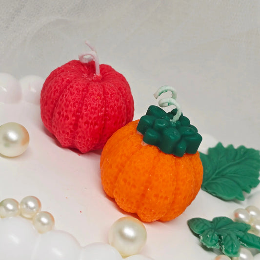 Handmade soy wax pumpkin and apple candles in fall colors, part of the Everyday Candles Fall Collection