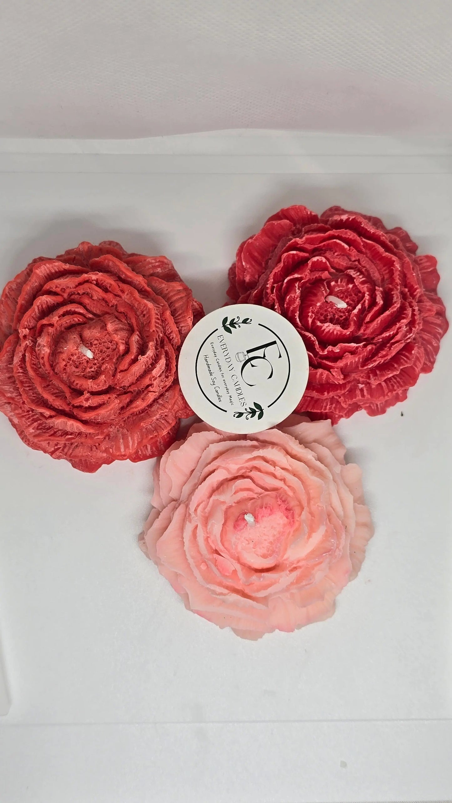 Handmade rose-shaped soy candle in pink, detailed petals, small-batch crafted in BC.