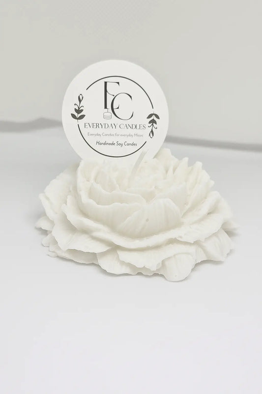 Handmade rose-shaped soy candle in white, detailed petals, small-batch crafted in BC.