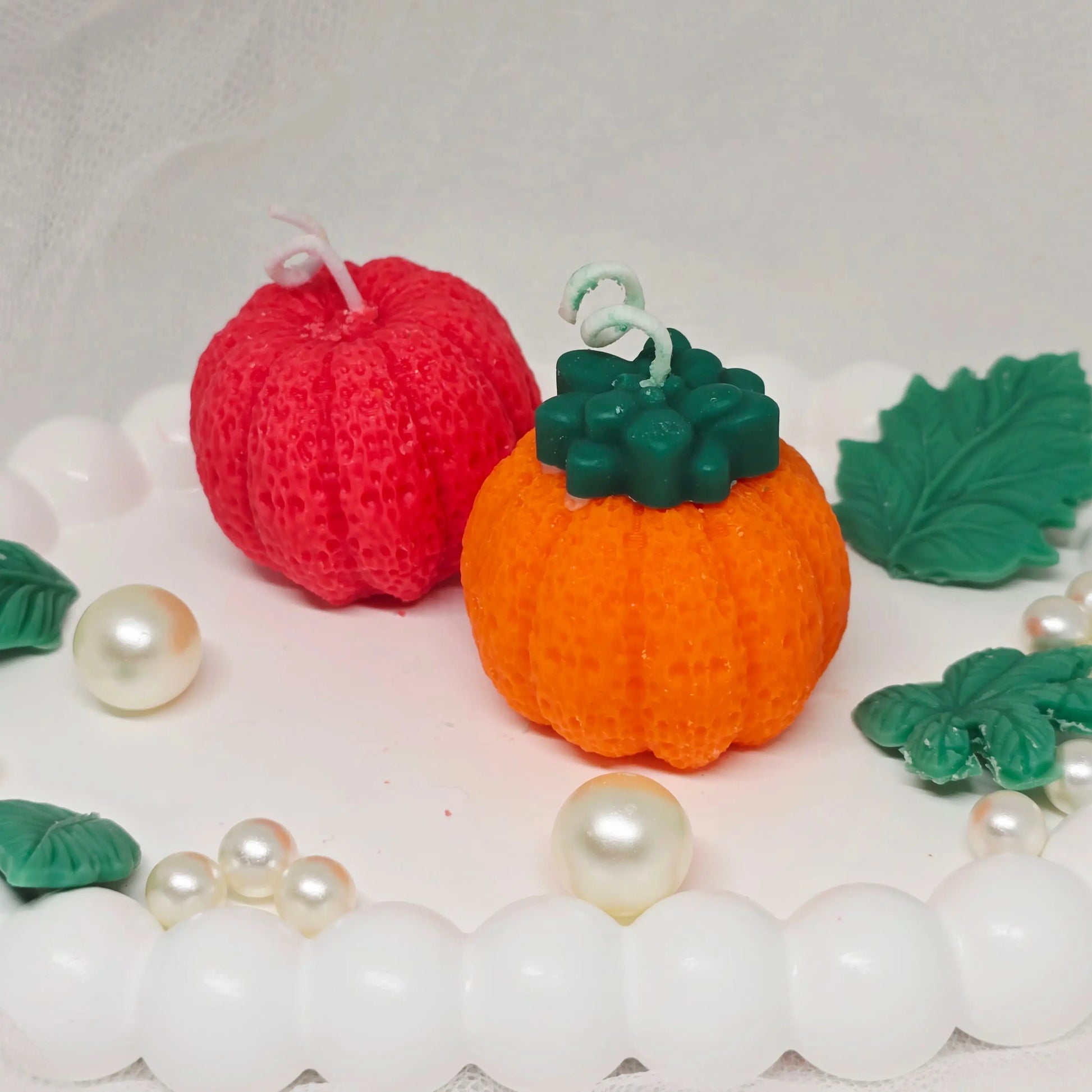 Handmade soy wax pumpkin and apple candles in fall colors, part of the Everyday Candles Fall Collection