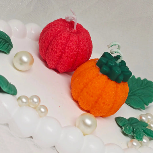 Handmade soy wax pumpkin and apple candles in fall colors, part of the Everyday Candles Fall Collection