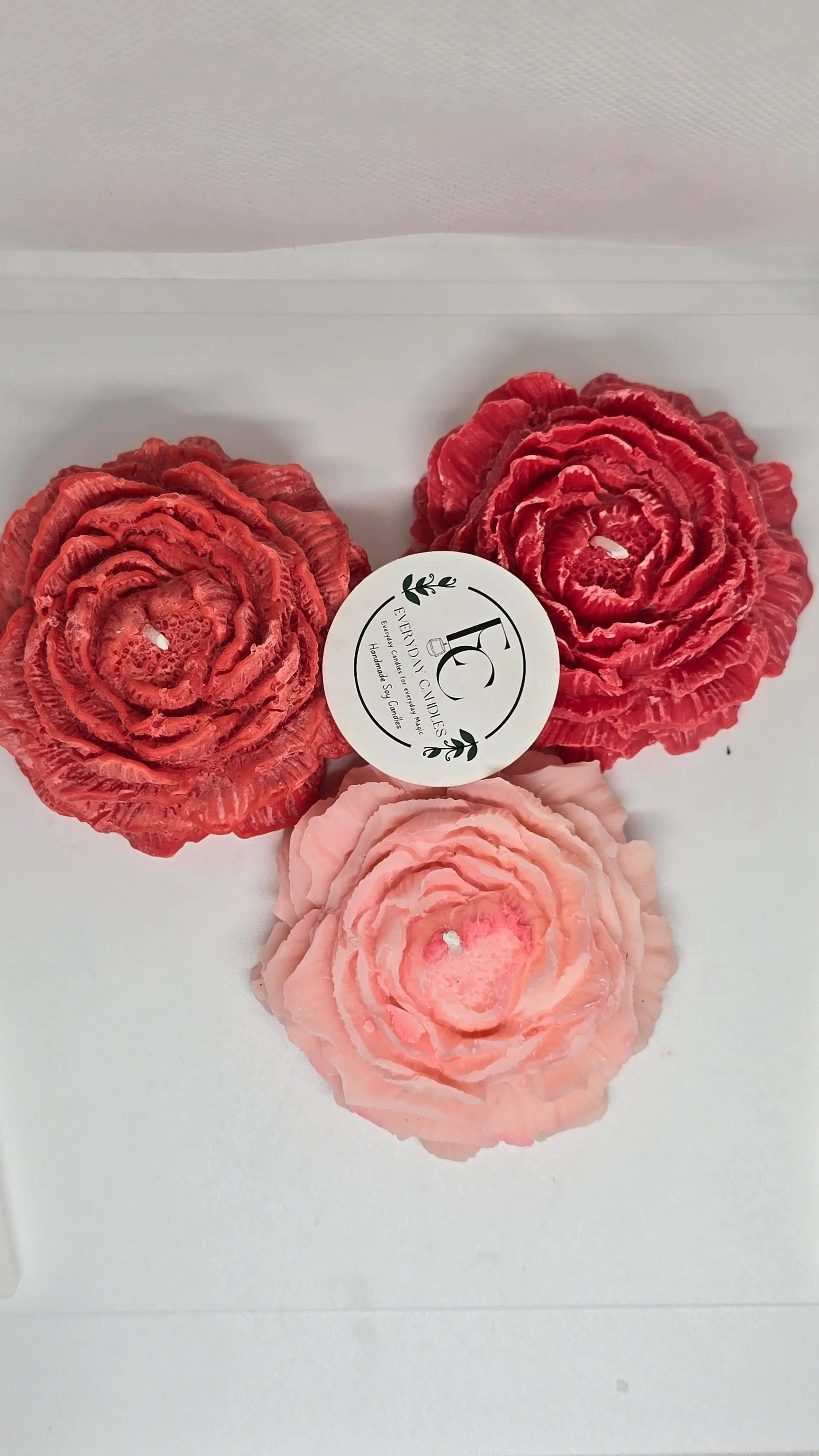 Handmade rose-shaped soy candle in pink, detailed petals, small-batch crafted in BC.